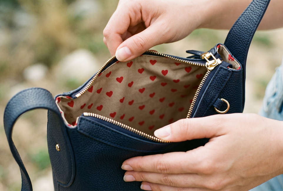Close view of a bag’s heart-print lining